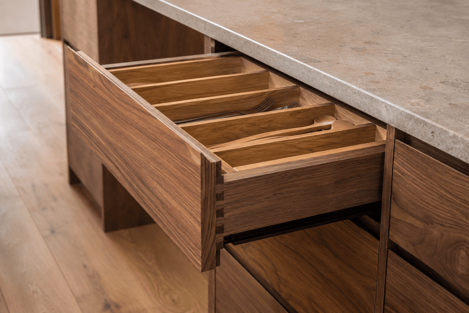 Walnut kitchen drawers with fitted storage compartments